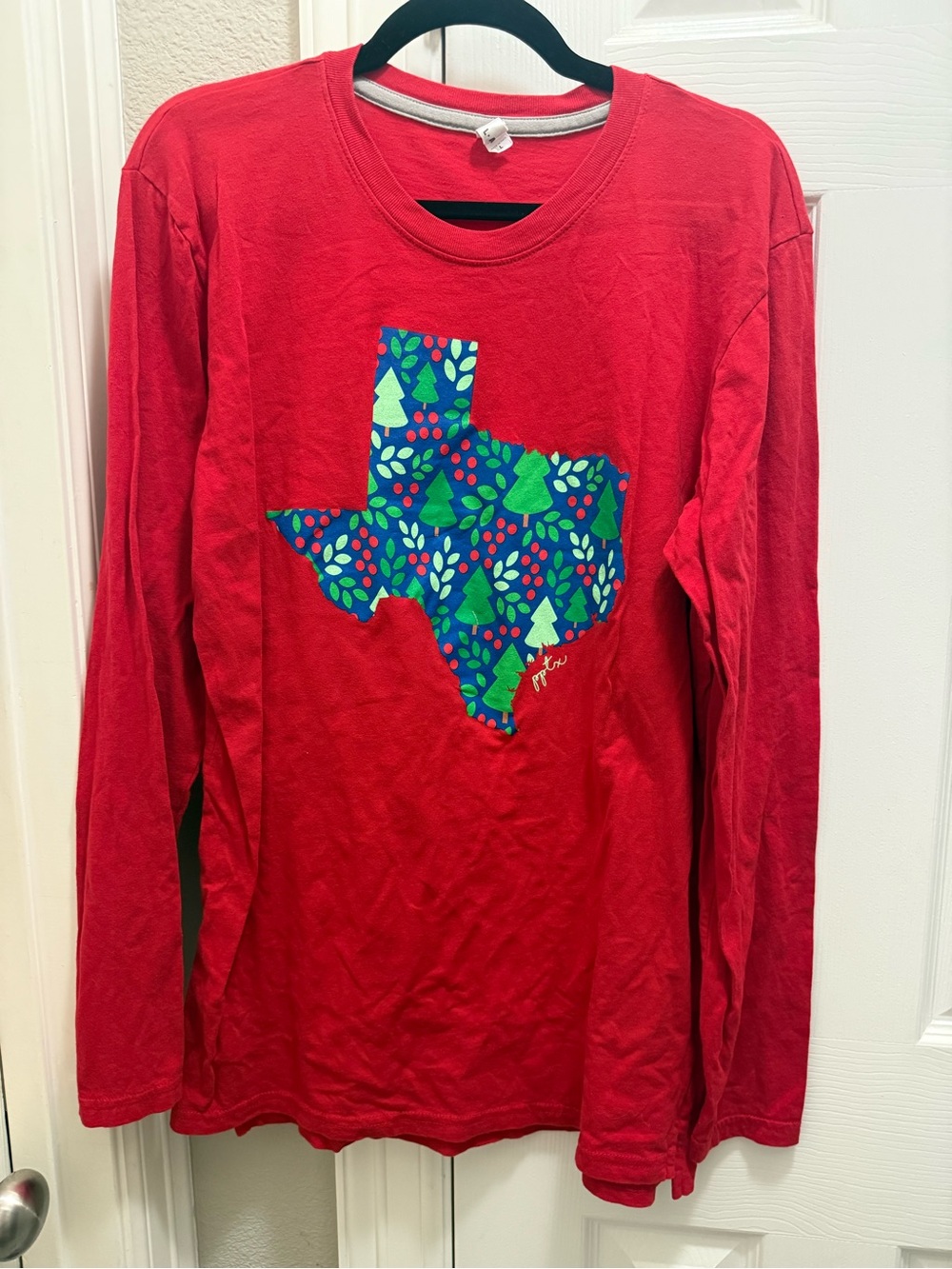 Women's Red Long-Sleeve Tee with Festive Texas Graphic